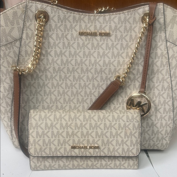 Michael Kors Handbags - Michael Kors Cream and Tan Tote with Gold Details